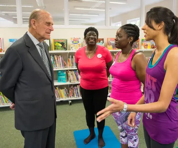 Prince Philip talking to ladies at the community centre 