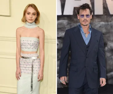 Woman in a floral crop top and man in a dark suit with sunglasses at a formal event.