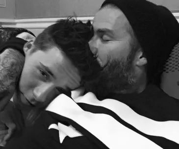 The battle of the Beckhams! David and Brooklyn wrestle it out in cute snap