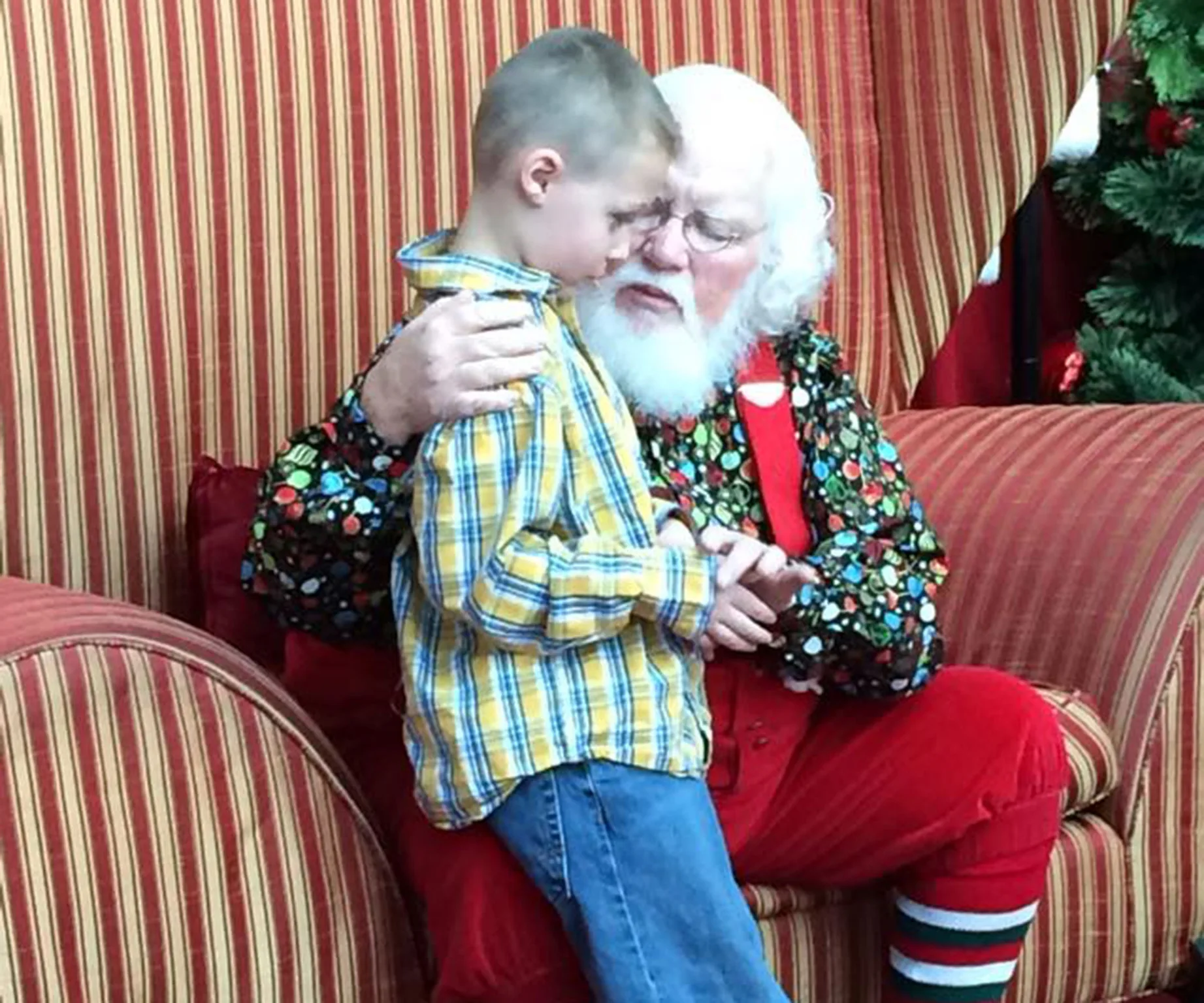 Autistic boy meets Santa Claus