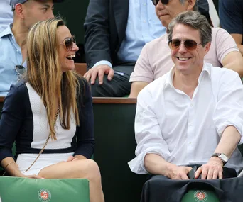 Hugh Grant and Anna Eberstein