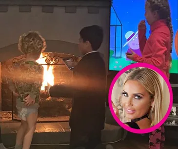 Children watching a fireplace and TV with a blonde woman in a circular inset on the right.