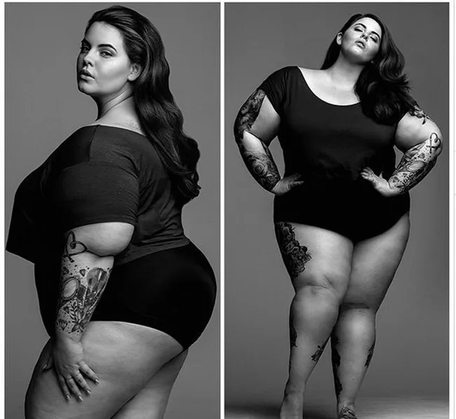 Two black and white photos of a woman posing confidently in a black outfit, showcasing tattoos on her arms and legs.
