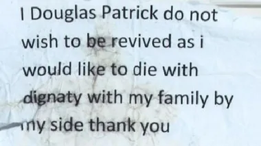 Handwritten note saying, "I Douglas Patrick do not wish to be revived as I would like to die with dignity with my family by my side thank you."