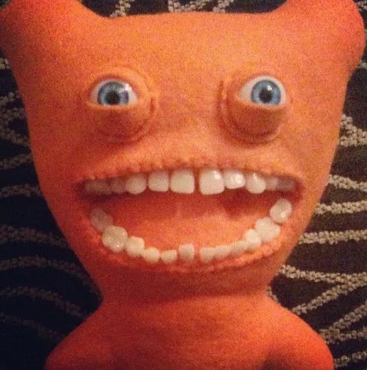 Creepy dolls with teeth best sale