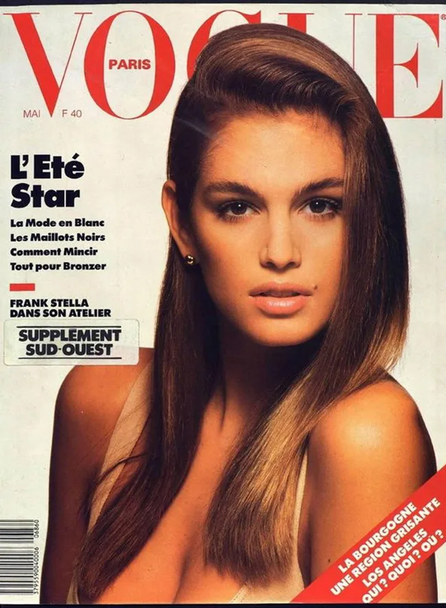 Cover of Vogue Paris featuring a model with long hair and neutral makeup, dated May, issue F 40.