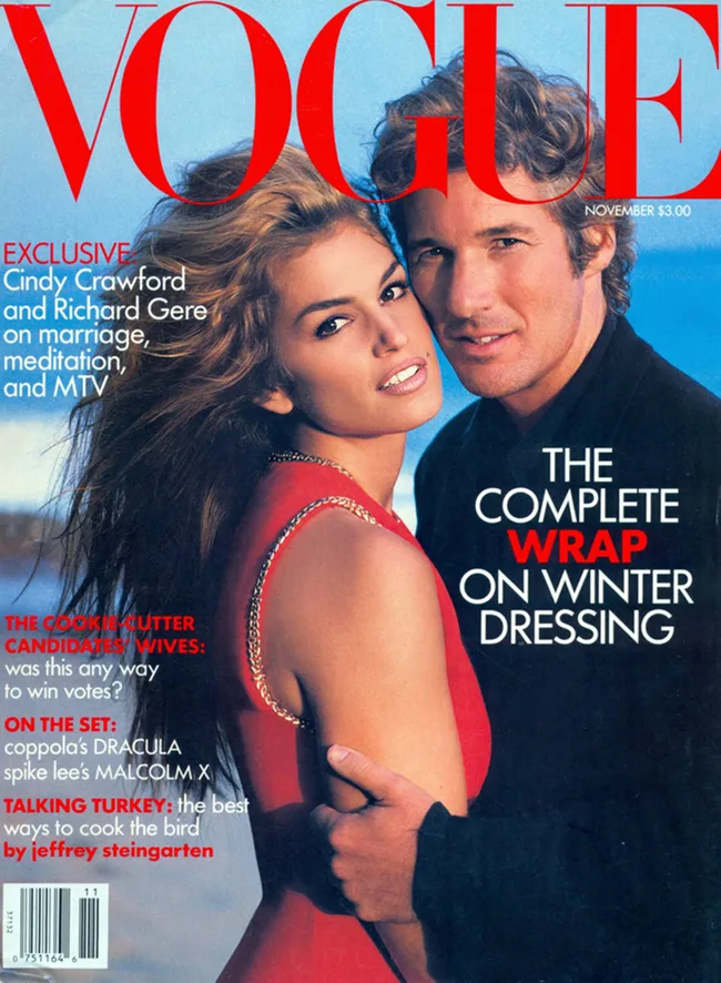 Couple poses on the cover of Vogue magazine, November issue, featuring topics on marriage, meditation, and fashion.