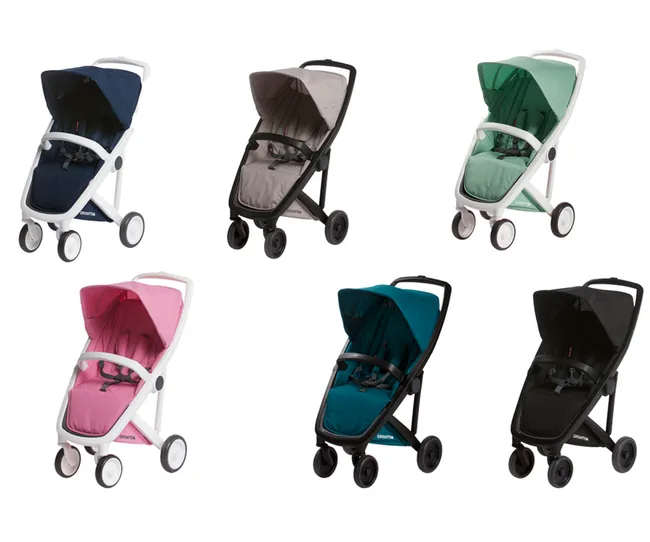 "Six Graviator strollers in various colors: navy, beige, green, pink, teal, black, each with a canopy and harness."