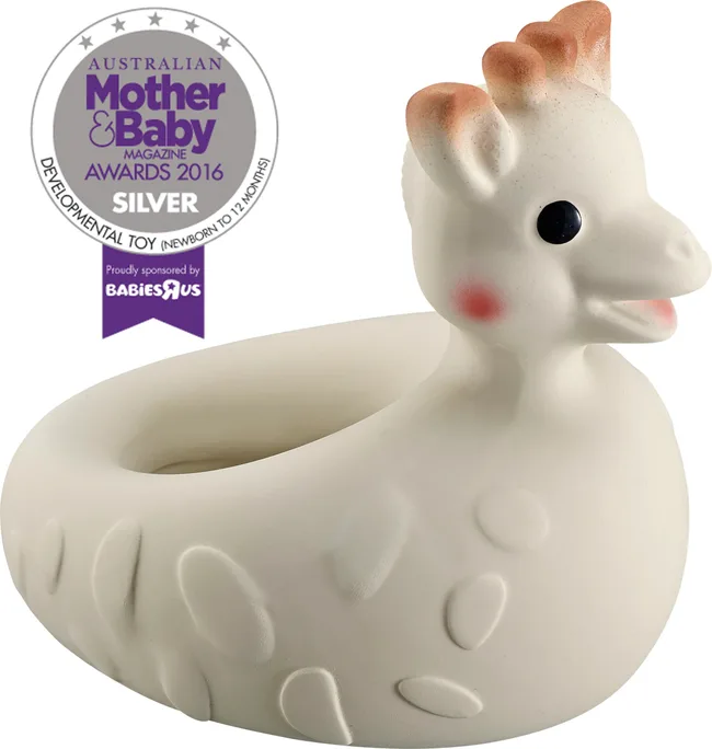 Rubber giraffe toy ring, beige with brown spots, beside an award badge from Australian Mother & Baby Magazine 2016.