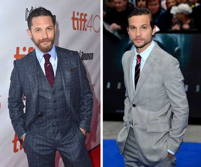 Two men in suits at different events; one in a dark suit, the other in light plaid. Red carpet and blue carpet backgrounds.
