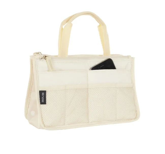 Cream bag organizer with multiple pockets and handles; a smartphone is in one pocket.