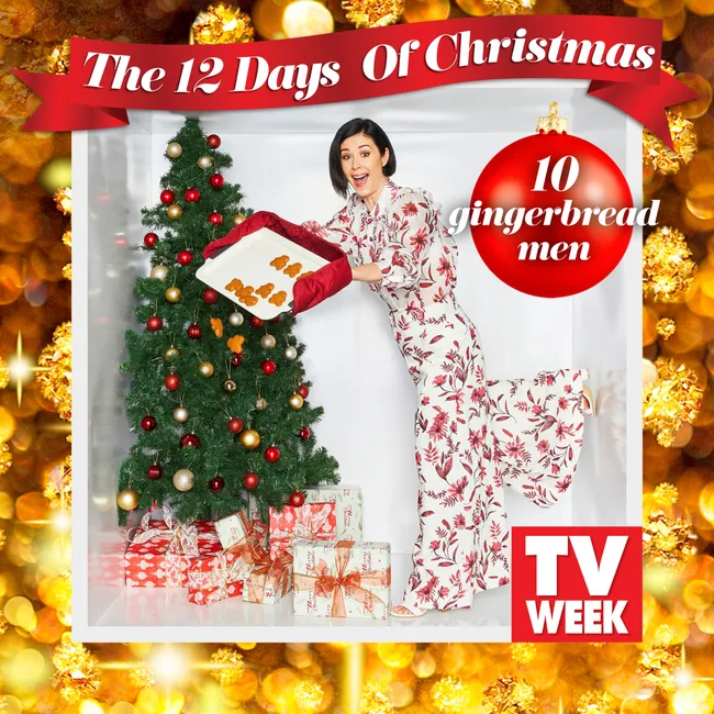 Woman in floral dress with gingerbread men near Christmas tree with gifts, "The 12 Days of Christmas" banner in background.
