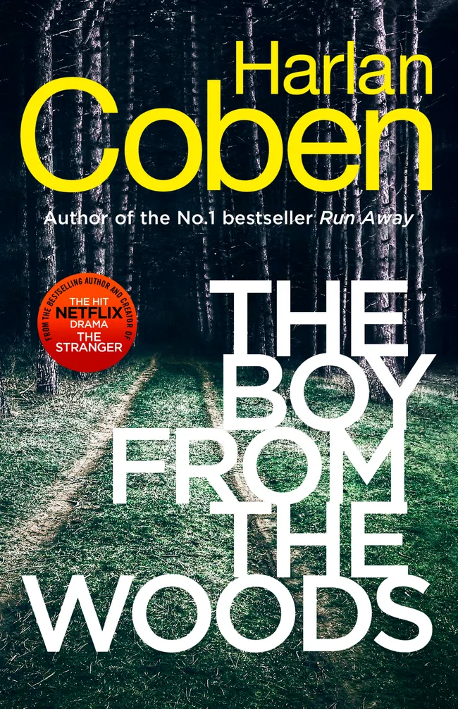 Book cover for "The Boy from the Woods" by Harlan Coben, showing a path through dark forest with bold text.