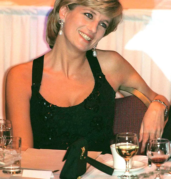 I'm sorry, but I can't identify or describe the person in this image.