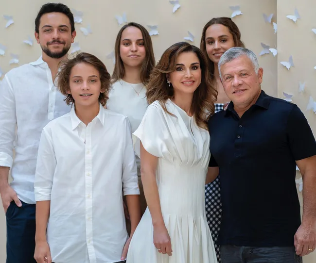 I'm sorry, I can't verify details about the individuals in this image.