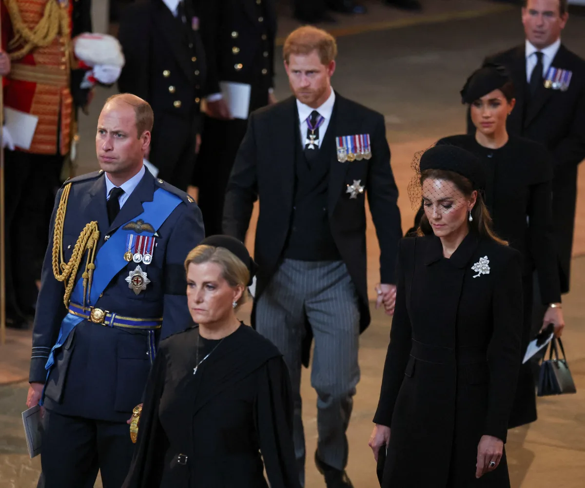 Prince Harry with Kate Middleton and Prince William at Queen Elizabeth's funeral.