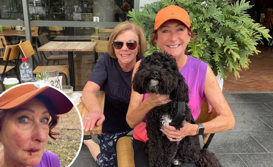 Two women sitting outside a café, one holding a black dog, with an inset of one woman's scratched face.