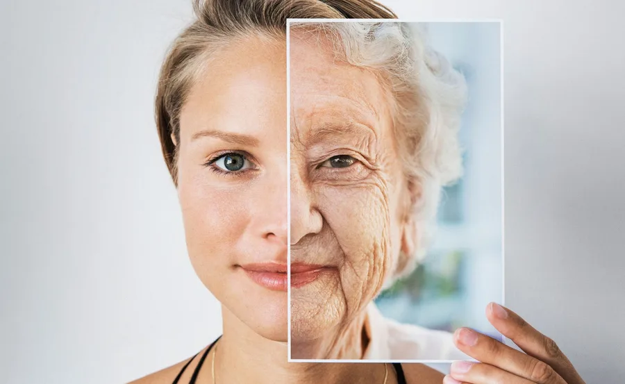 Split photo of a woman's face showing youthfulness on one side, aging on the other.