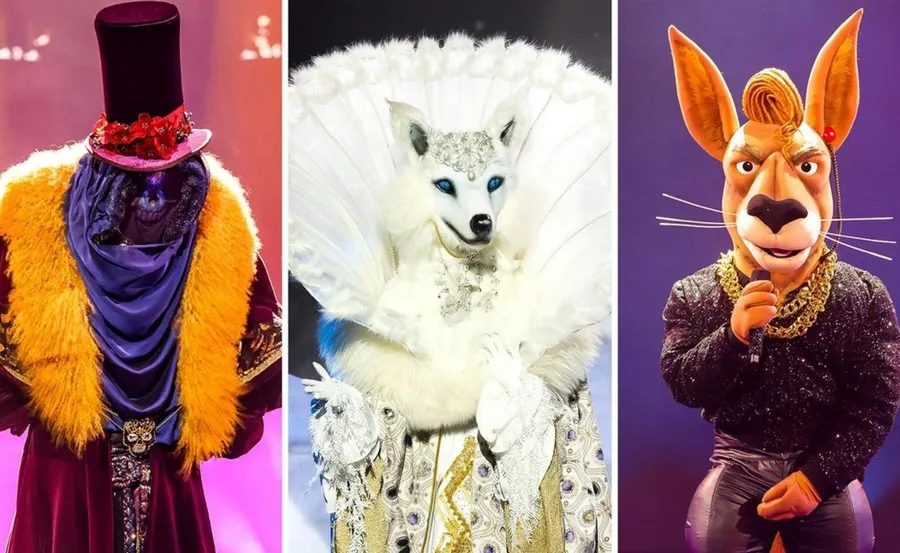 Three masked singers in elaborate costumes: top hat figure, snowy white wolf, and purple-suited kangaroo.