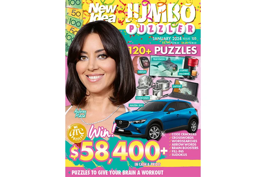 Cover of New Idea Jumbo Puzzler with woman smiling, prizes like a car, $58,400 cash, and over 120 puzzles.