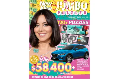 Cover of New Idea Jumbo Puzzler with woman smiling, prizes like a car, $58,400 cash, and over 120 puzzles.