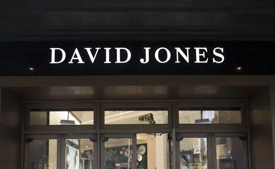 David Jones store entrance with illuminated sign above glass doors.