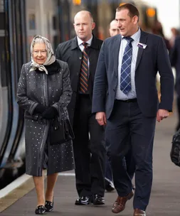 Queen joins commuters on train back to London