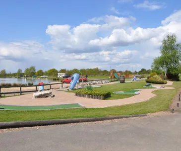 Parents arrested after boy drowned while they packed car