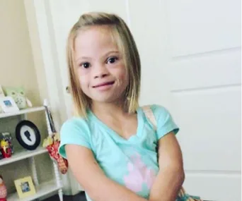 See this 7-year-old cutie celebrate having Down syndrome