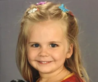 Toddler dresses herself for school photo, goes viral