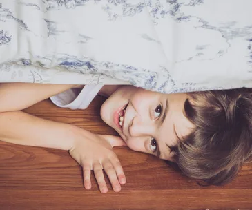 Missing boy sparked police hunt before being found under his bed