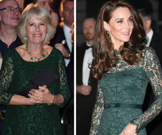 Two women in elegant green lace dresses at a formal event, smiling with people in the background.