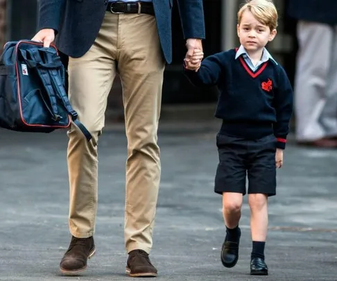 Prince William with Prince George on his first day of school