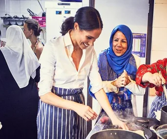 Duchess Meghan dons her apron for new charity cookbook