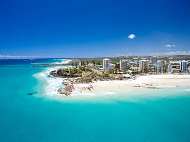 An aerial view looking at the famous Snapper Rocks and Rainbow bay at Coolanagatta on Queensland's Gold Coast