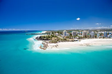 An aerial view looking at the famous Snapper Rocks and Rainbow bay at Coolanagatta on Queensland's Gold Coast