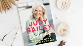 Book cover: "Judy Bailey Evolving: Finding Health & Happiness as We Age" with a smiling woman on the cover.