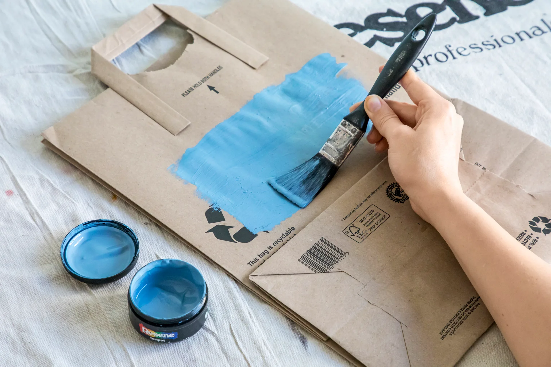 Painting paper bag light blue