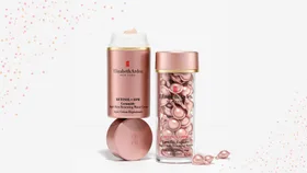 Elizabeth Arden Retinol + HPR Ceramide cream and capsules against a white background.