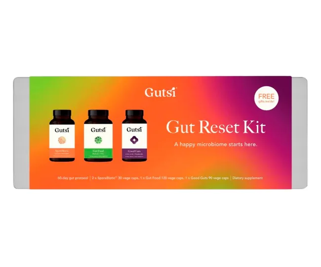 Gutsi Gut Reset Kit packaging with three supplement bottles and colorful background.