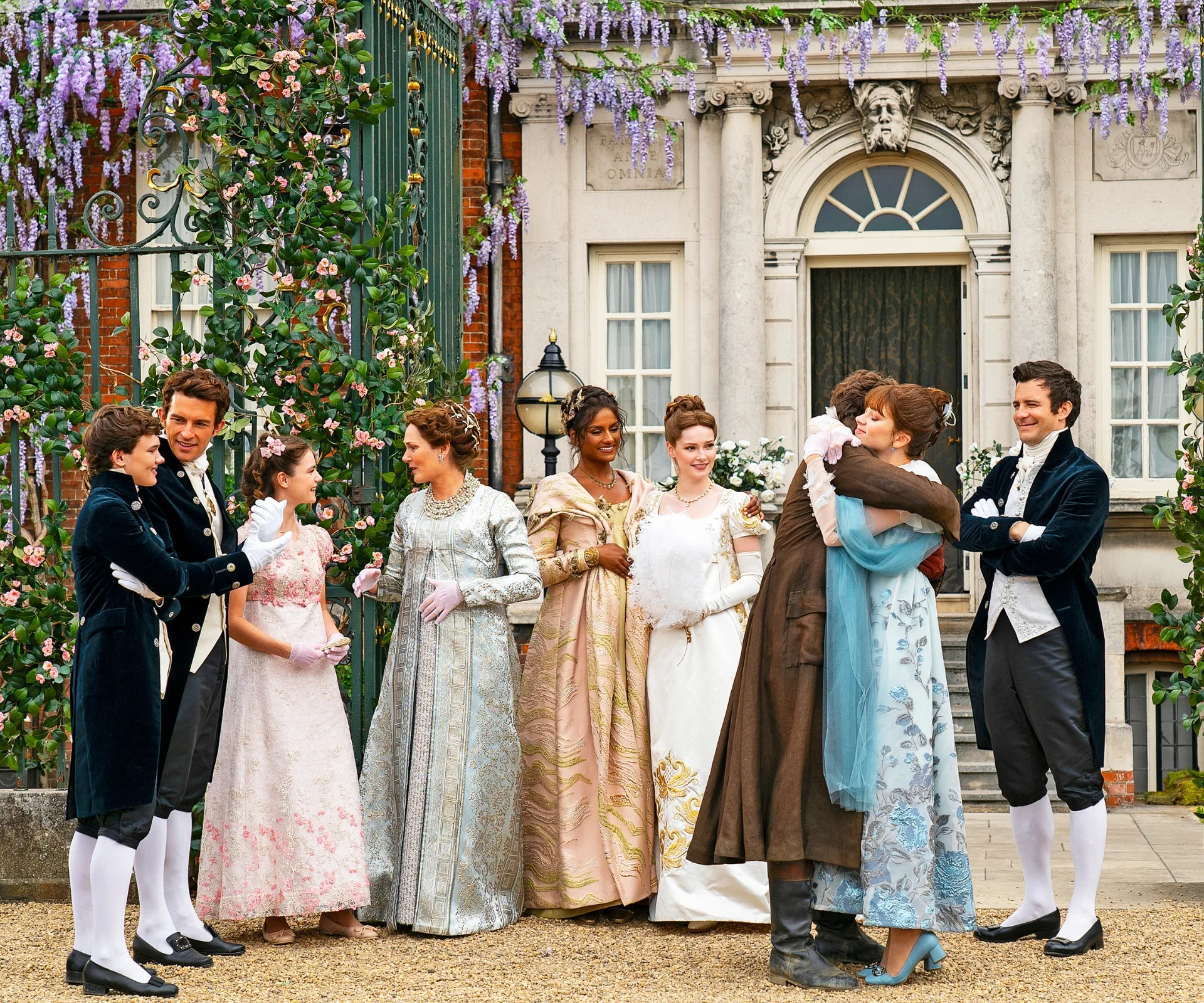 Bridgerton season three cast hugging in costume