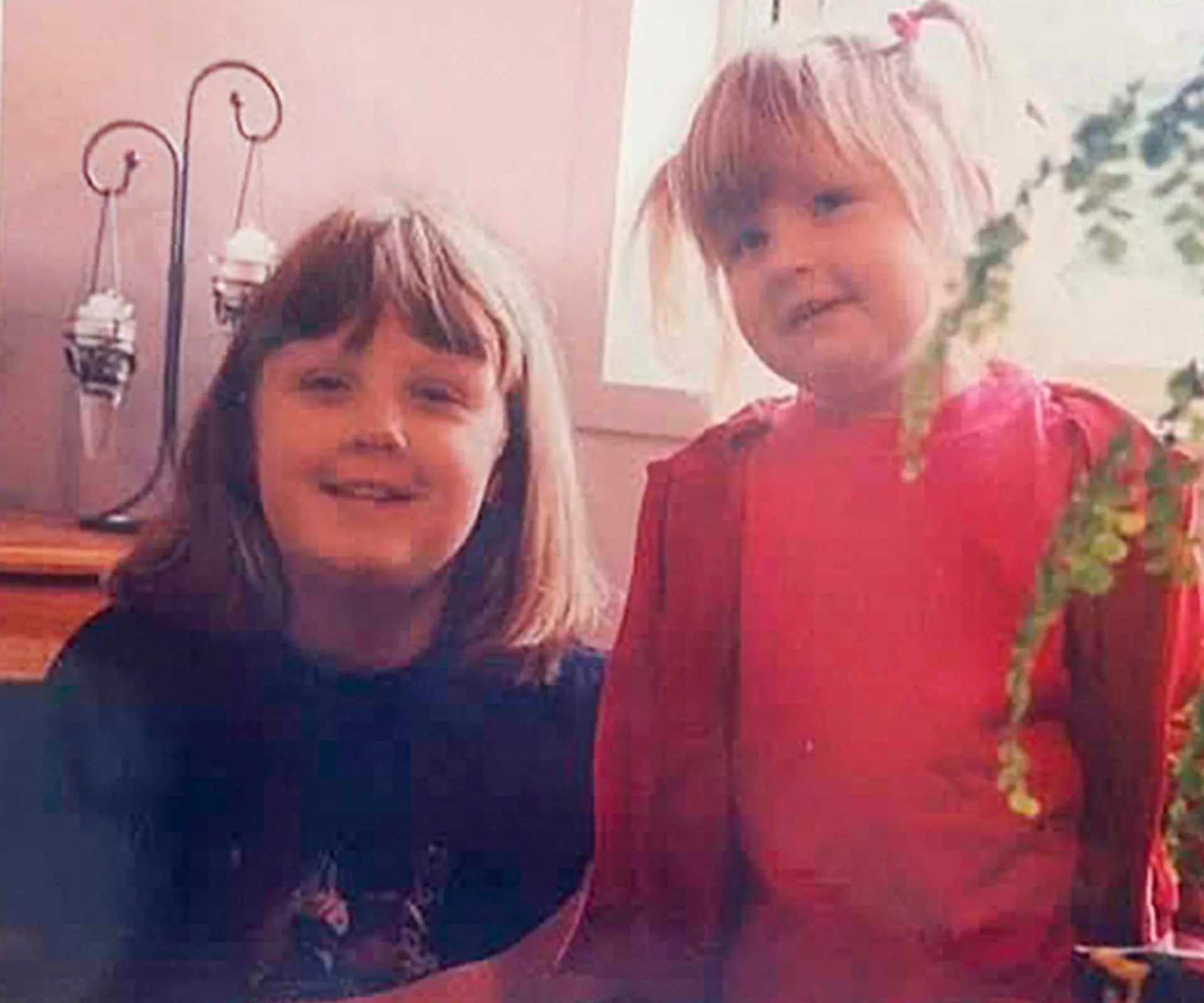 Tayla and sister Jade when they were young