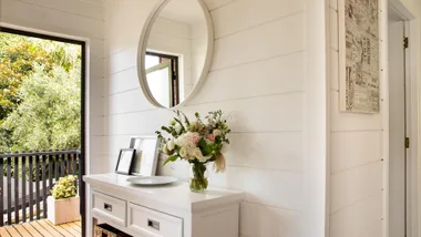 Lockwood home makeover, entry hall walls given a white modern look