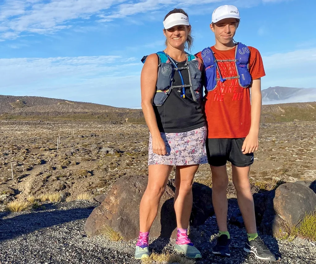 Francesca Rudkin on a barren landscape with son Oscar