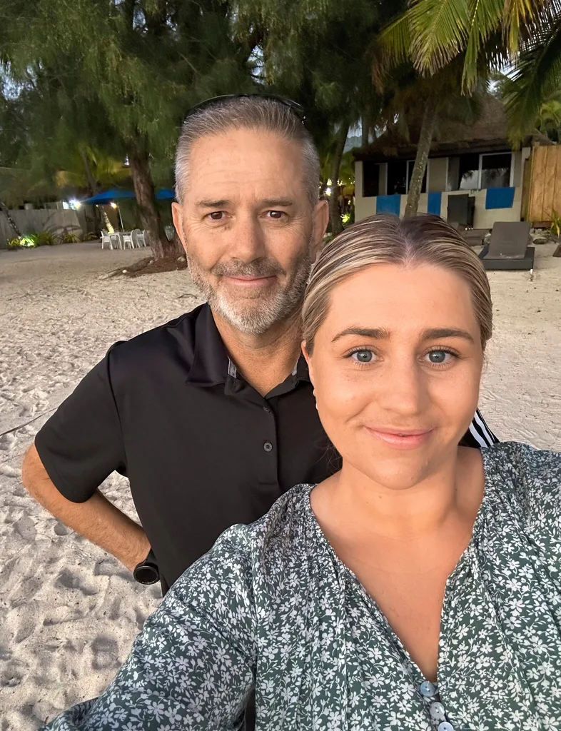 Jordan Oppert and father Kelvin on a beach in Rarotonga