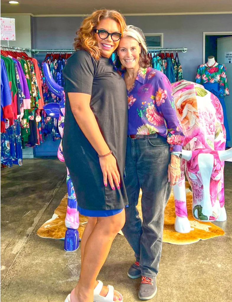 Mary Haddock-Staniland and Annah Stretton standing in front of racks of clothes