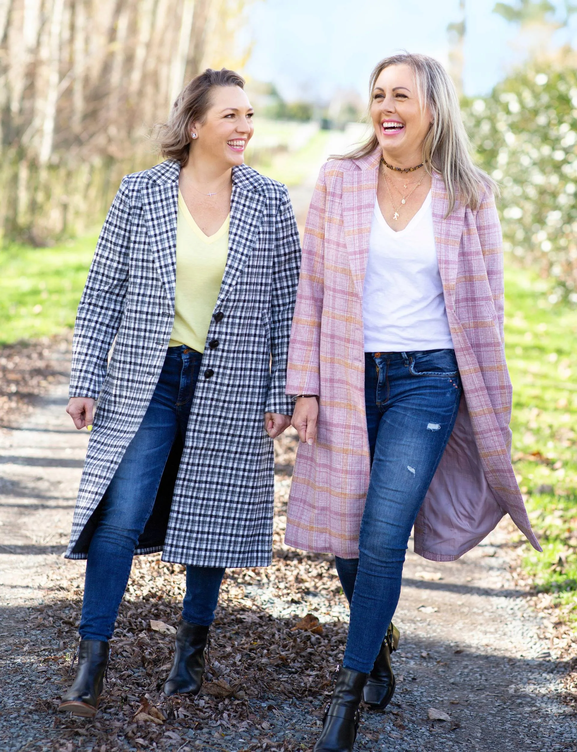 Jackie and Becki walking down a gravel path together