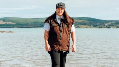 Kaimoana Queens founder Karis Vesey in front of the water