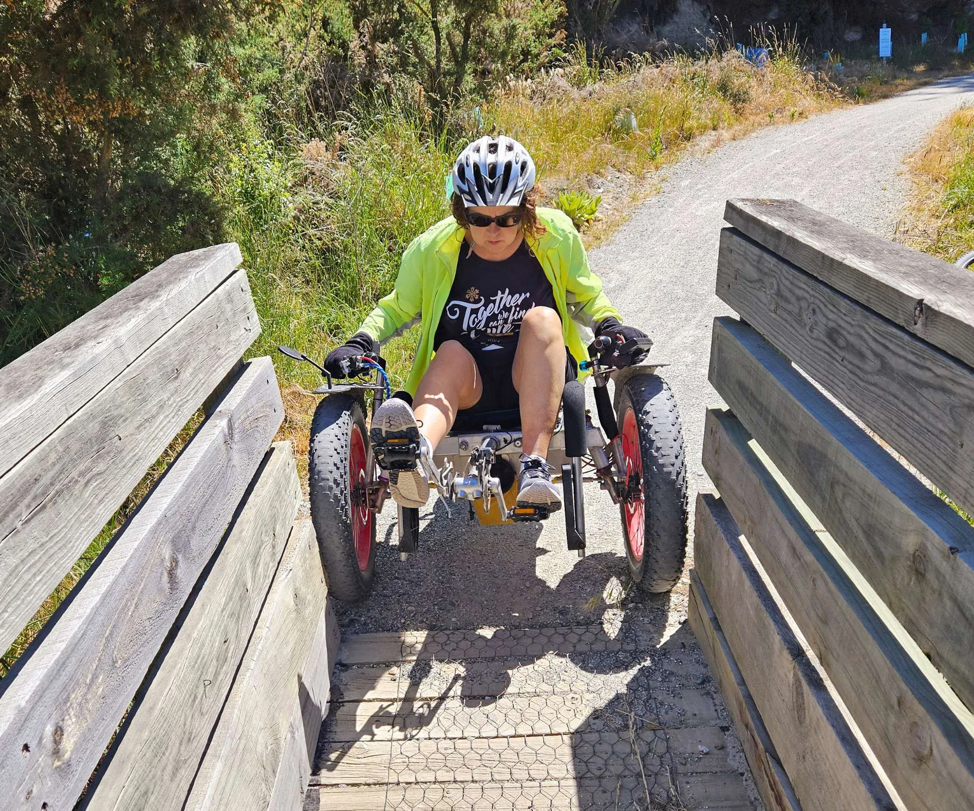 Dr Natalie struggling to fit her wheelchair on the narrow bridge