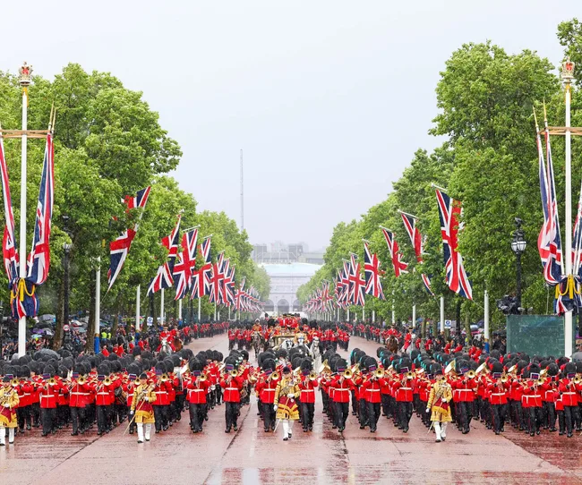 The British royal guard standing in formation in front of Buckingham Palace